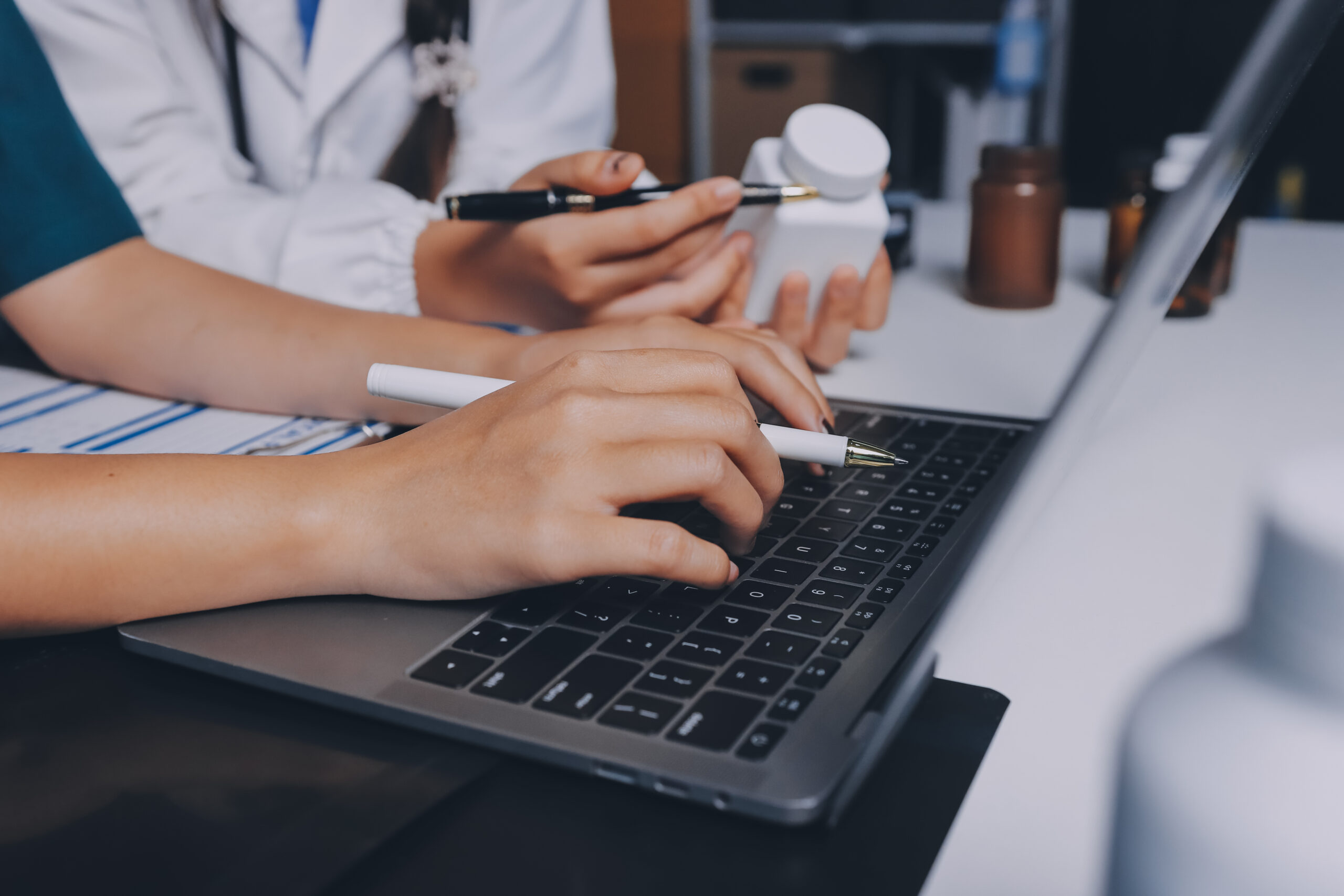doctor studying on computer solving FCPS medicine MCQs online